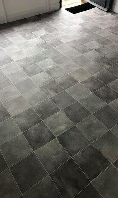 Mixed grey vinyl flooring in tile pattern